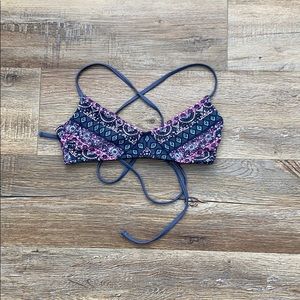 this is a pink blue peach and gray swim top (xs)